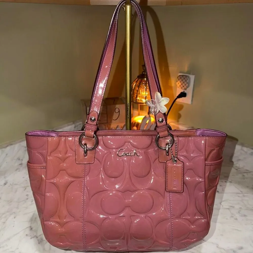 coach gallery embossed signature patent leather tote mauve pink colorway